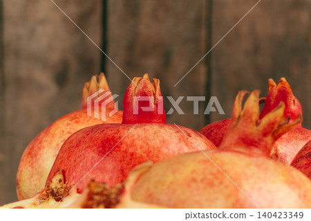 Group of pomegranate fruits close up background Group of pomegranate fruits close up background 140423349