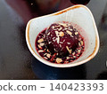 Gourmet Poached Pear with Almond Topping 140423393