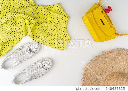 Flat lay of woman summer outfit on white background Flat lay of woman summer outfit on white background 140423815