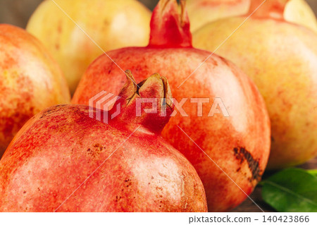 Group of pomegranate fruits close up background Group of pomegranate fruits close up background 140423866
