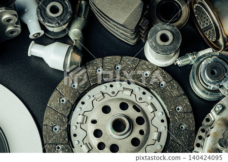 Close up of new car parts on black background Close up of new car parts on black background 140424095