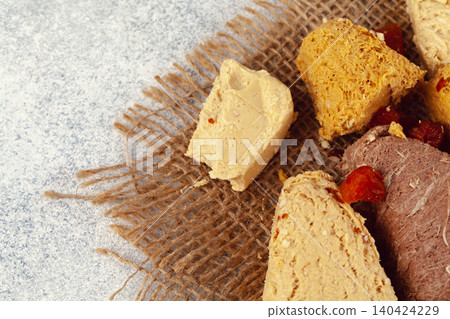 Assortment of turkish desserts baklava and halva 140424229