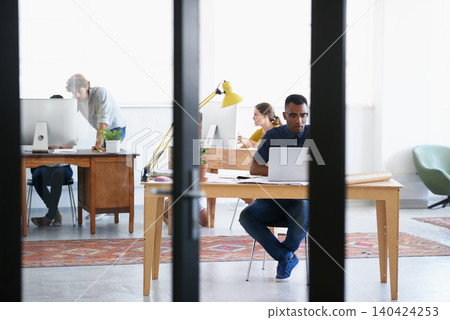Architect man, laptop and research in modern office with blueprint for construction, projects or design. Creative or black male person with web, tech and online for planning, postage or mail 140424253