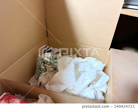 Hina dolls stored in cardboard boxes Hina dolls stored in cardboard boxes 140424721