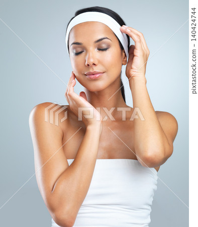 Woman, headband and glow for beauty, skincare and cosmetology in studio on light grey background. Female person, natural makeup and flawless skin for facial, microblading and dermatology treatment Woman, headband and glow for beauty, skincare and cosmetology in studio on light grey background. Female person, natural makeup and flawless skin for facial, microblading and dermatology treatment 140424744