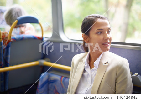Transport, travel and commute for business woman sitting on bus for journey and trip to work. Young person, passenger or patron with smile and thinking in suit on vehicle for workplace or office Transport, travel and commute for business woman sitting on bus for journey and trip to work. Young person, passenger or patron with smile and thinking in suit on vehicle for workplace or office 140424842