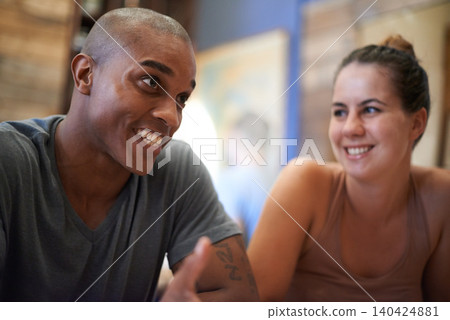 Happy, man and woman in cafe for talking, smile and laughing together in conversation. People, discussion and communication in meeting diverse, friends and chat while relaxing or enjoying restaurant Happy, man and woman in cafe for talking, smile and laughing together in conversation. People, discussion and communication in meeting diverse, friends and chat while relaxing or enjoying restaurant 140424881