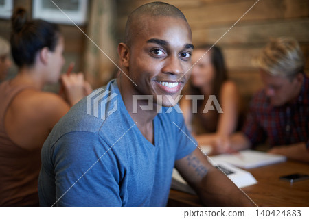 Portrait, smile and student man with group, African male scholar and happy for university knowledge. Relax and break from book study, learning from research at table for educational development Portrait, smile and student man with group, African male scholar and happy for university knowledge. Relax and break from book study, learning from research at table for educational development 140424883