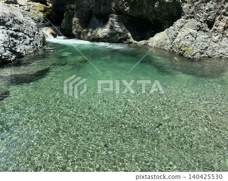 Mountain stream, emerald green Mountain stream, emerald green 140425530