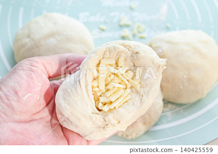 Naan dough for wrapping cheese Naan dough for wrapping cheese 140425559