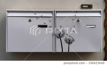 White Mailboxes With Black Dandelion Stickers on Wall 140425648