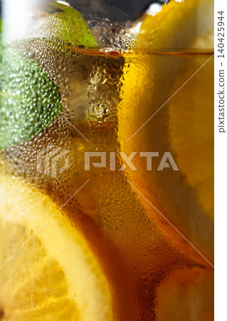 Iced tea in a misted glass. Macro shot. Iced tea in a misted glass. Macro shot. 140425944