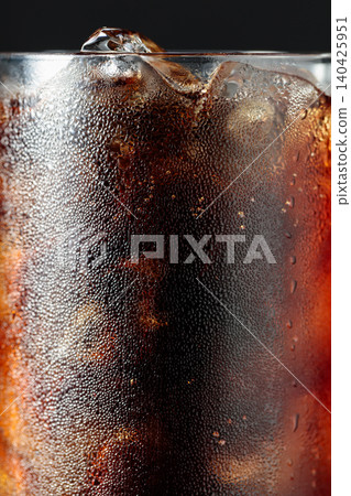 Cola with ice in misted glass. Cola with ice in misted glass. 140425951