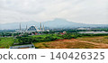 A magnificent mosque with a backdrop of mountains and green rice fields 140426325