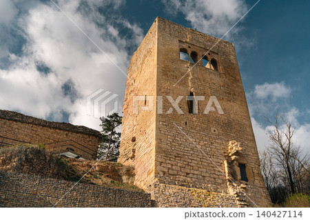 Historic Castle Tower with Blue Sky and Clouds Historic Castle Tower with Blue Sky and Clouds 140427114
