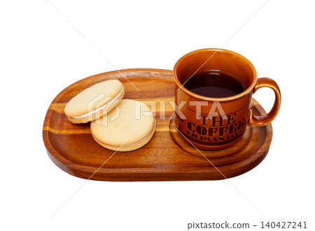 Enjoying tea time with a galette filled with lemon cream and coffee. [White background, cutout] 140427241