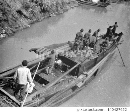 Vintage photograph, 1937-1945, Republic of China during the Second Sino-Japanese War: Japanese soldiers sailing on a river in Nanjing or Shanghai. Vintage photograph, 1937-1945, Republic of China during the Second Sino-Japanese War: Japanese soldiers sailing on a river in Nanjing or Shanghai. 140427652