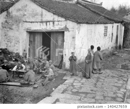 Vintage photograph, 1937-1945, Republic of China during the Second Sino-Japanese War, showing civilians and Japanese soldiers in Nanjing or Shanghai. Vintage photograph, 1937-1945, Republic of China during the Second Sino-Japanese War, showing civilians and Japanese soldiers in Nanjing or Shanghai. 140427659