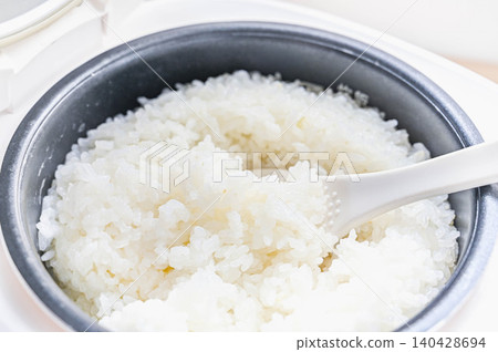 Fluffy, perfectly cooked white rice in a rice cooker Fluffy, perfectly cooked white rice in a rice cooker 140428694