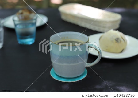 Coffee and table on a cafe table Coffee and table on a cafe table 140428756