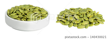 Peeled pumpkin seeds in ceramic bowl isolated on white background 140430021