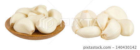 garlic cloves in wooden bowl isolated on white background close up 140430142