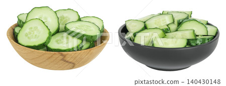 Sliced cucumber in woodenn and ceramic bowl isolated on white background with full depth of field Sliced cucumber in woodenn and ceramic bowl isolated on white background with full depth of field 140430148