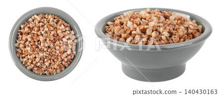 Boiled buckwheat in a ceramic bowl isolated on white background. Top view. Flat lay Boiled buckwheat in a ceramic bowl isolated on white background. Top view. Flat lay 140430163
