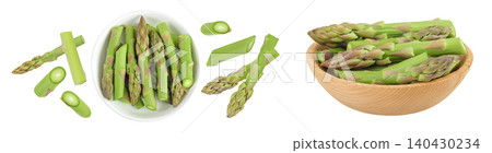 fresh asparagus in ceramic and wooden bowl isolated on white background. Top view. Flat lay. fresh asparagus in ceramic and wooden bowl isolated on white background. Top view. Flat lay. 140430234