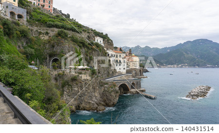 View of beautiful Amalfi town, Campania, Italy. Amalfi coast is most popular travel and holiday destination in Europe. Amalfi cityscape on coast line of mediterranean sea, Amalfi coast, Italy. View of beautiful Amalfi town, Campania, Italy. Amalfi coast is most popular travel and holiday destination in Europe. Amalfi cityscape on coast line of mediterranean sea, Amalfi coast, Italy. 140431514