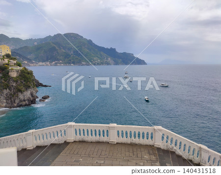 View of beautiful Amalfi town, Campania, Italy. Amalfi coast is most popular travel and holiday destination in Europe. Amalfi cityscape on coast line of mediterranean sea, Amalfi coast, Italy. View of beautiful Amalfi town, Campania, Italy. Amalfi coast is most popular travel and holiday destination in Europe. Amalfi cityscape on coast line of mediterranean sea, Amalfi coast, Italy. 140431518