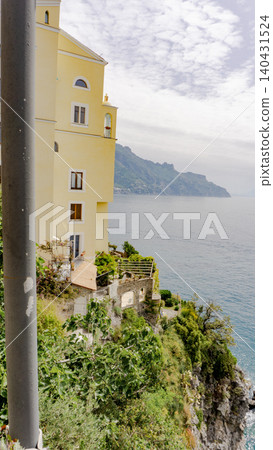 View of beautiful Amalfi town, Campania, Italy. Amalfi coast is most popular travel and holiday destination in Europe. Amalfi cityscape on coast line of mediterranean sea, Amalfi coast, Italy. View of beautiful Amalfi town, Campania, Italy. Amalfi coast is most popular travel and holiday destination in Europe. Amalfi cityscape on coast line of mediterranean sea, Amalfi coast, Italy. 140431524