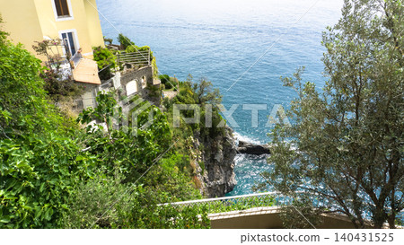 View of beautiful Amalfi town, Campania, Italy. Amalfi coast is most popular travel and holiday destination in Europe. Amalfi cityscape on coast line of mediterranean sea, Amalfi coast, Italy. View of beautiful Amalfi town, Campania, Italy. Amalfi coast is most popular travel and holiday destination in Europe. Amalfi cityscape on coast line of mediterranean sea, Amalfi coast, Italy. 140431525