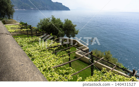 View of beautiful Amalfi town, Campania, Italy. Amalfi coast is most popular travel and holiday destination in Europe. Amalfi cityscape on coast line of mediterranean sea, Amalfi coast, Italy. View of beautiful Amalfi town, Campania, Italy. Amalfi coast is most popular travel and holiday destination in Europe. Amalfi cityscape on coast line of mediterranean sea, Amalfi coast, Italy. 140431527