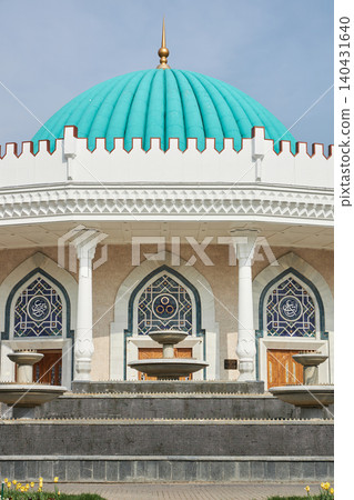 Amir Timur museum with turquoise dome in Tashkent, Uzbekistan. Traditional Islamic architecture and central Asian heritage building. Famous historical monument and cultural landmark. Amir Timur museum with turquoise dome in Tashkent, Uzbekistan. Traditional Islamic architecture and central Asian heritage building. Famous historical monument and cultural landmark. 140431640