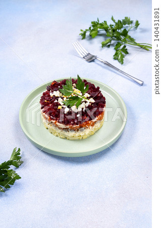 Layered herring salad with vegetables and mayonnaise Layered herring salad with vegetables and mayonnaise 140431891