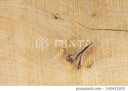 Natural beige wood grain texture with cracks and tree rings. Rustic wooden surface background Natural beige wood grain texture with cracks and tree rings. Rustic wooden surface background 140431955