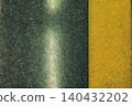 A textured background of rough, non-slip flooring with dark green and yellow borders. 140432202