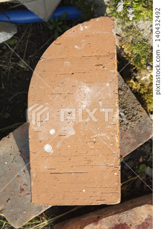 Weathered Red Clay Brick Closeup Weathered Red Clay Brick Closeup 140432492