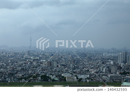 A cityscape where a sudden thunderstorm is approaching due to a sudden change in weather. A cityscape where a sudden thunderstorm is approaching due to a sudden change in weather. 140432593