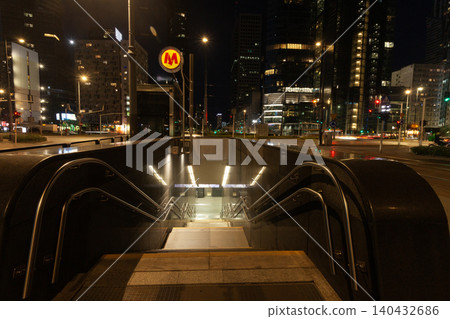 Night view of Warsaw with the entrance to the metro Night view of Warsaw with the entrance to the metro 140432686
