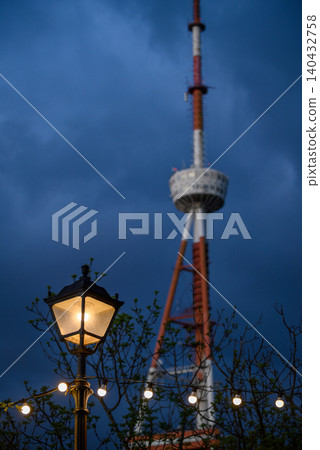 Old light post with Tbilisi TV broadcasting communications tower in the background in Tbilisi, Georgia 140432758