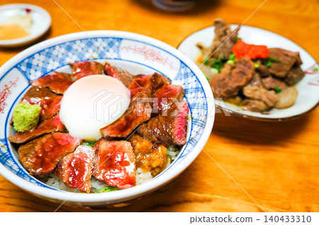 The famous Akagyu beef bowl from Kumamoto, topped with a soft-boiled egg. The famous Akagyu beef bowl from Kumamoto, topped with a soft-boiled egg. 140433310