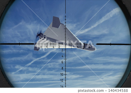 Strike drone is positioned in center of targeting reticle against sky. 140434588