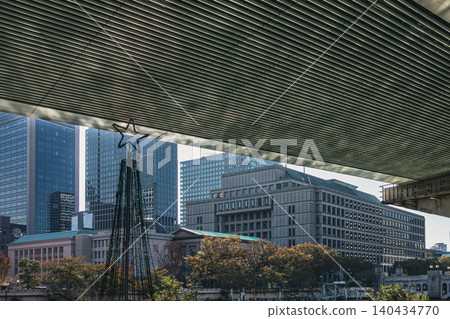 Historical buildings and star-shaped objects viewed from beneath the bridge. Historical buildings and star-shaped objects viewed from beneath the bridge. 140434770