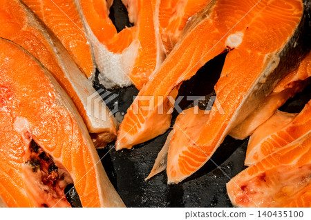 Raw salmon steak fish fresh seafood supermarket counter background sea food freshness Raw salmon steak fish fresh seafood supermarket counter background sea food freshness 140435100