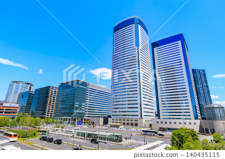 Urban landscape near Toyosu Station intersection in Koto Ward, Tokyo. Urban landscape near Toyosu Station intersection in Koto Ward, Tokyo. 140435115