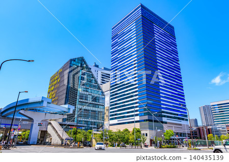 Urban landscape near Toyosu Station intersection in Koto Ward, Tokyo. Urban landscape near Toyosu Station intersection in Koto Ward, Tokyo. 140435139