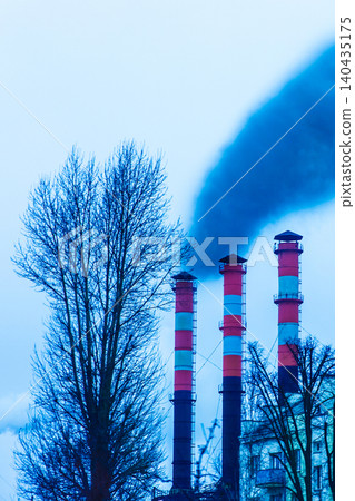 Pollution of the environment, air and ecology are global problems. Toxic smoke from the dirty chimney of an industrial plant is released into the atmosphere Pollution of the environment, air and ecology are global problems. Toxic smoke from the dirty chimney of an industrial plant is released into the atmosphere 140435175