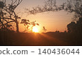 sunset over mountains 140436044